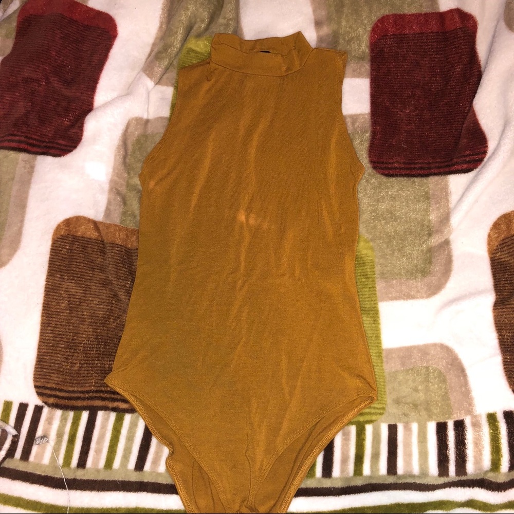 Tan body suit